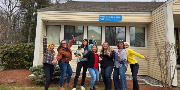 Clinical team at J&C Holistic Counseling Services standing together outside their counseling office.