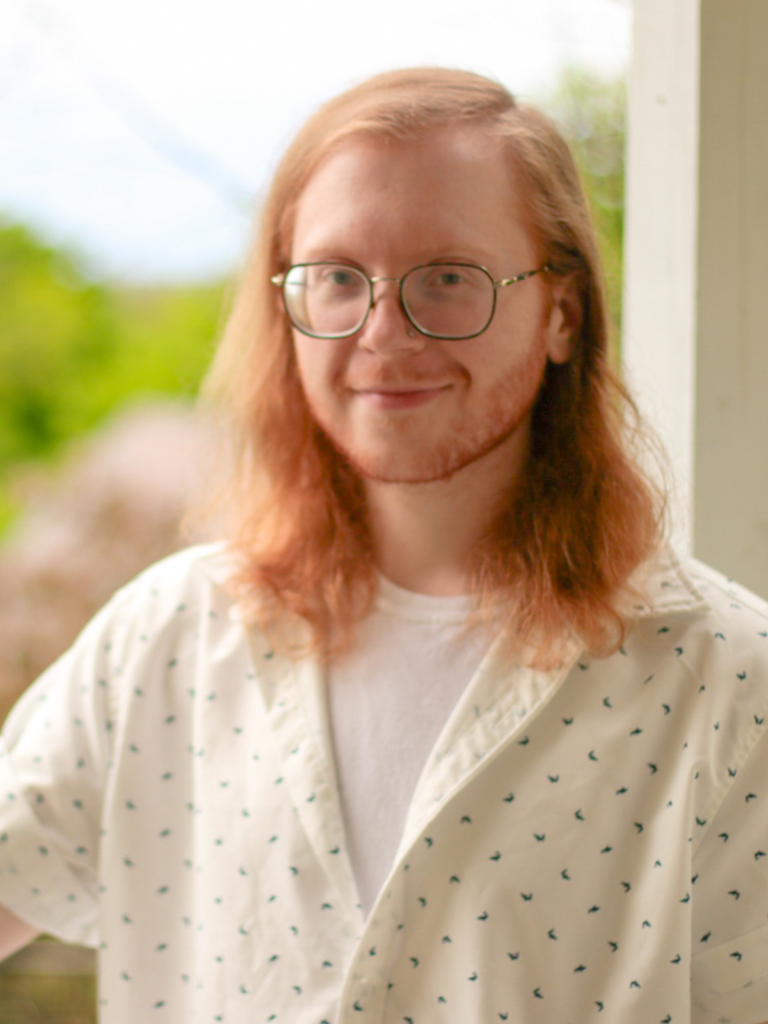 Portrait of Jake Mackie-Morrissey, Pre-Licensed Clinician at J&C Holistic Counseling in Manchester, New Hampshire.